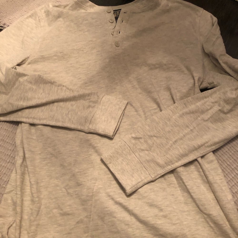 Men’s cotton long sleeve shirt with buttons.